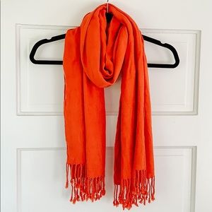 Orange fringed scarf